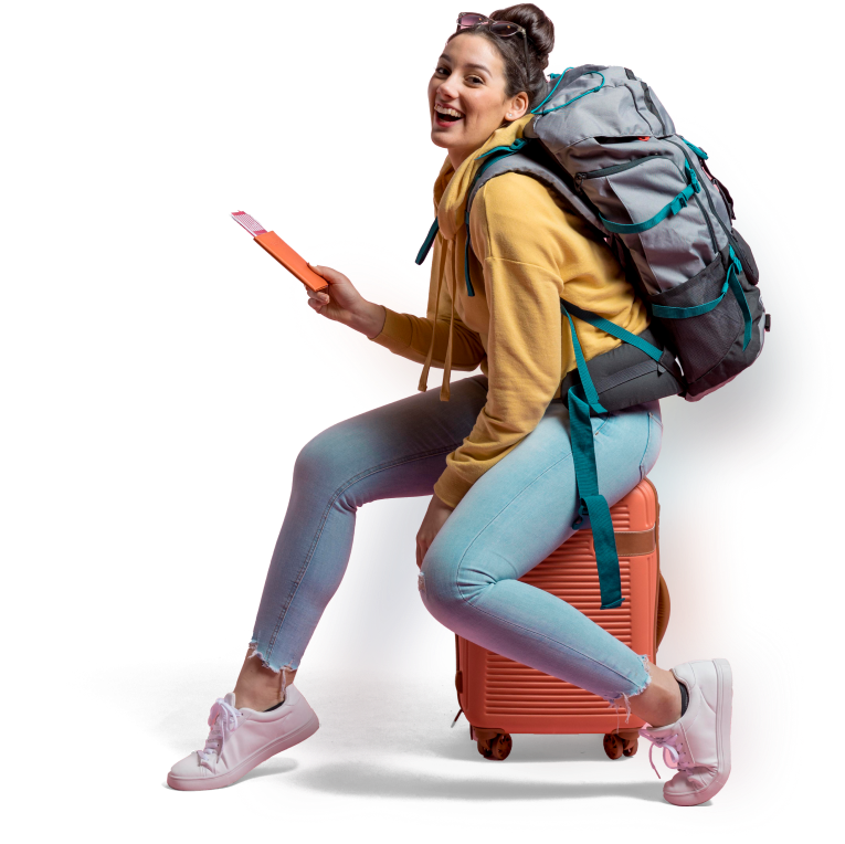 Traveler sitting on luggage